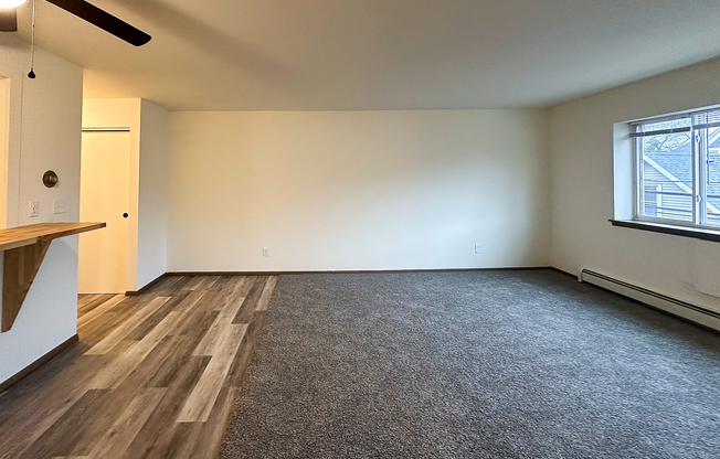 2 Bed / 1 Bath - 1,000 SF - Living Room + Bar