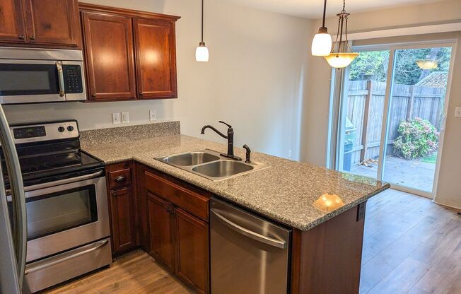 407 AND 409 MADRONA AVE SE