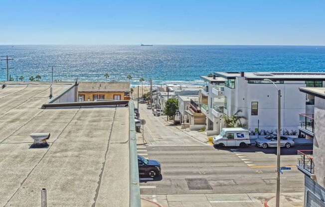 MODERN, BRIGHT & SPACIOUS, TRI-LEVEL DETACHED TOWNHOUSE W/ UNOBSTRUCTED OCEAN VIEWS, 2 BALCONIES & 4-CAR PARKING CLOSE TO RESTAURANTS, SHOPPING, EASY FREEWAY ACCESS & JUST 2 BLOCKS TO BEACH!