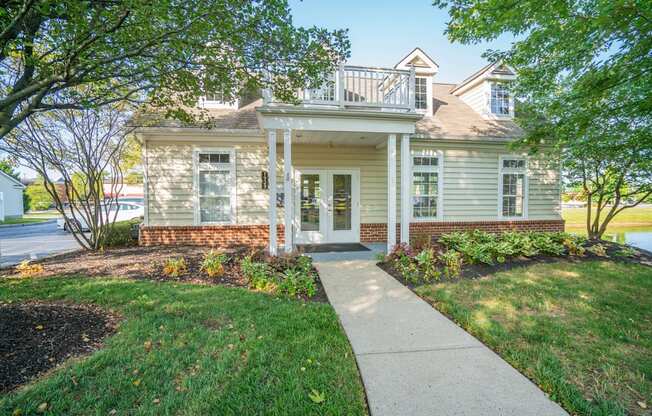a white house with a sidewalk in front of it at Slate Ridge, Reynoldsburg, OH 43068