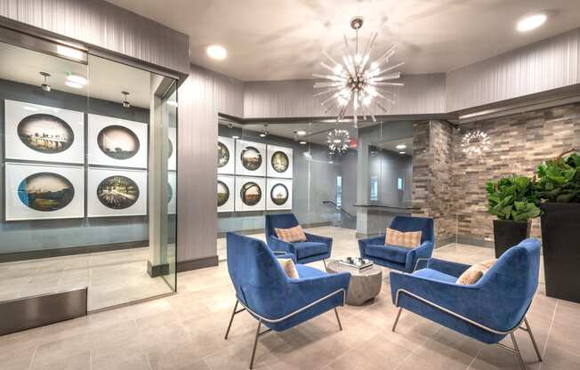 Resident sitting area inside the sky lounge facing decorative lighting.