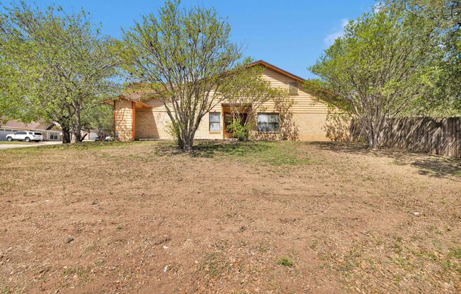Stunning corner lot home offering convenient accessibility and spacious living.