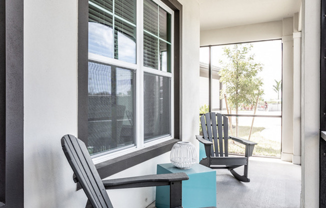 furnished patio area with seating in daytime