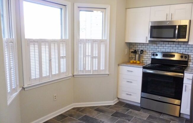 Fully updated townhome located walking distance to shops and close to interstates!