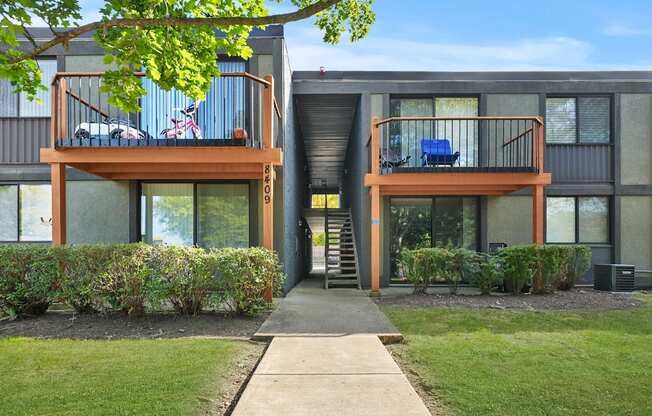 Exterior with greenery at Woodland Ridge Apartments in Woodridge, IL