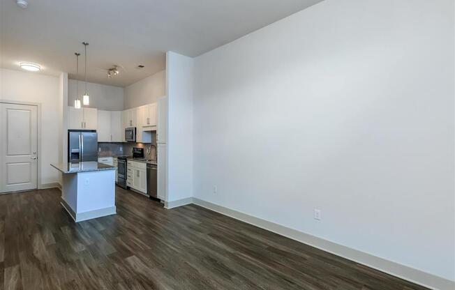 Luxury Vinyl Plank Flooring In Berewick Pointe Kitchen And Living Room in Charlotte, NC Apartment Homes