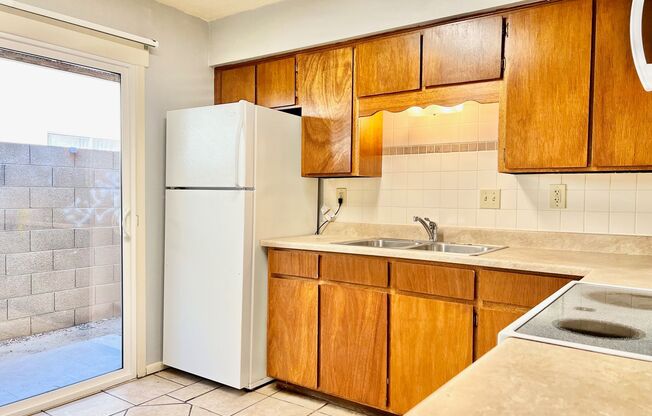 Charming, Centrally Located 2 Bed 1 Bath Apartment with Private Back Patio at The Cambridge Apartments!