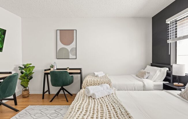 A 4 bedroom, 2 bathroom apartment with common areas and a fully functional kitchen at 1823 Pelham Ave. Unit #7
