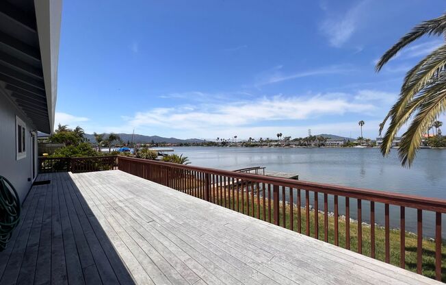 WATERFRONT HOME IN BEL MARIN KEYS WITH BOAT DOCK, FENCED YARD.