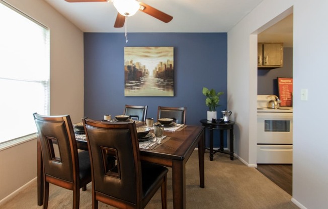 This is a picture of the dining room in the 980 square foot, 2 bedroom, 1 bath model apartment at Fairfield Pointe Apartments in Fairfield, Ohio.