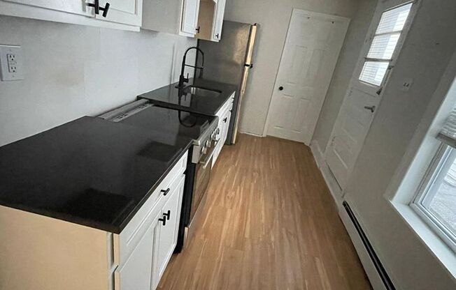 Cozy 2 bedroom 1 bathroom house with off-street parking