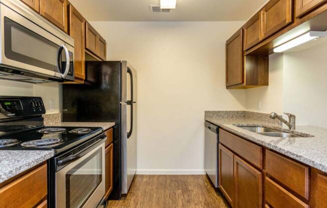 Large updated kitchen with stainless steel appliances at Bexley Village, Greenwood, 46143