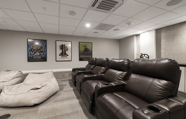 Media room with seating and bing bag chairs Rasa Oakland Apartments for rent