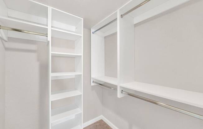 a walk in closet in a 555 waverly unit