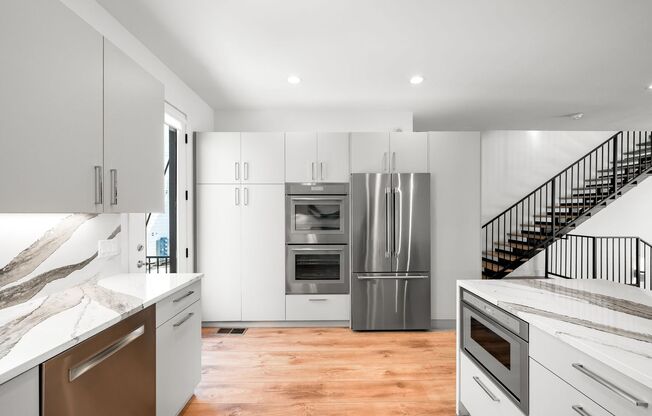 LUX 3BD, 5BA Modern Townhome Near Cherry Creek, Congress Park, and City Park