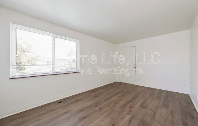 9295 E 14 AVE