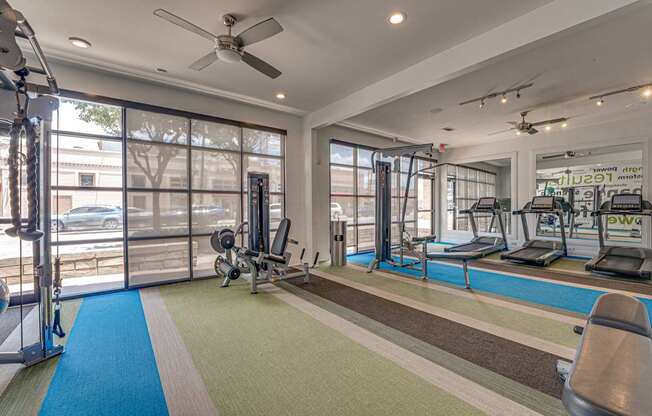 Fitness center with cardio and strength equipment at Vue Live Oak Apartments, Dallas, 75204