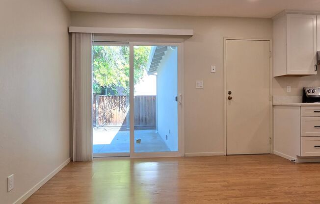 Renovated Home with New Kitchen, Stainless Steel Appliances, Wood Flooring, Fresh Paint, New Driveway, Great Location!