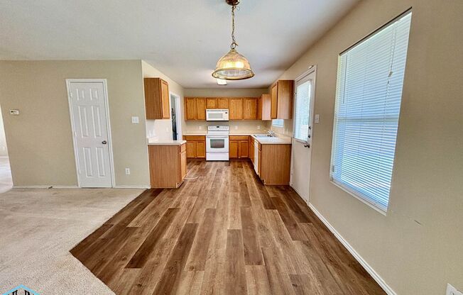 A Residence of Exceptional Space and Comfort Nestled in a Serene Neighborhood, Conveniently Located to USAA, the Medical Center and IH 10!