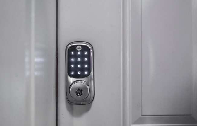 an image of a door handle with a smart lock on it