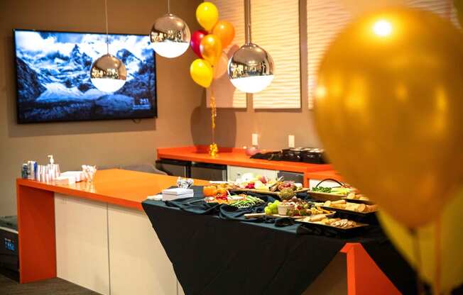 a view of the buffet table at a restaurant with balloons