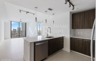 100 NW 6th St