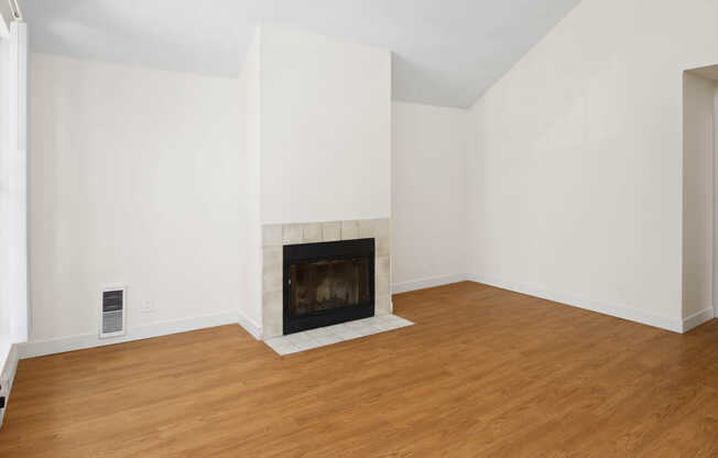 Living Room with Fireplace and Hard Surface Flooring