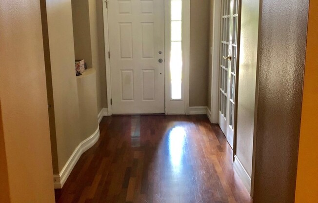 MOVE IN SPECIAL- Charming 3/2 home w/ formal office/4th bedroom and fenced yard in Harmony