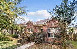 Charming 3-bedroom, 2-bath single-family home with a spacious 2-car garage.