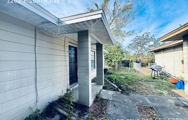 1202 E 108 AVE