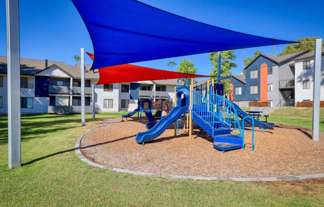 our apartments offer a playground for your little onesat The Julia, Mesa Arizona