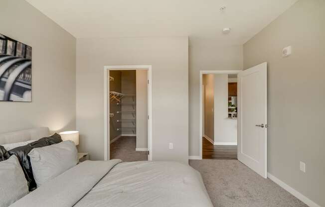 Bedroom with walk-in closet at Ascend at Woodbury in Woodbury MN
