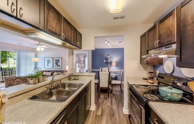 Fitted Kitchen With Island Dining at Brittany Commons Apartments, Spotsylvania, 22553