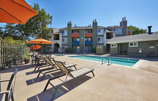 Swimming Pool with Deck Area at Sloan's Lake Apartments in Lakewood, CO