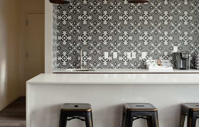 The Century Kitchen Counter and Stools