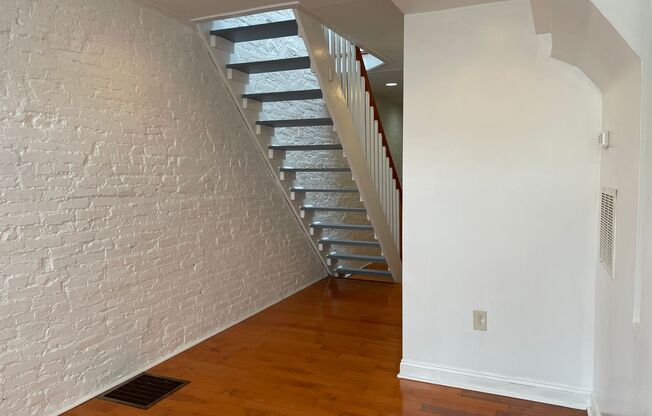 Charming 2-Bedroom, 1.5-Bathroom Brick Townhouse in Pigtown