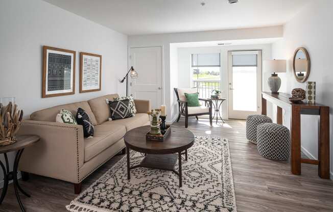 a living room with a couch and a table