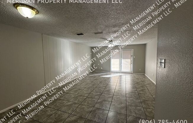 7303 Ave X