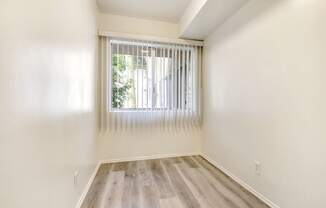 Dining area with wood inspired floors