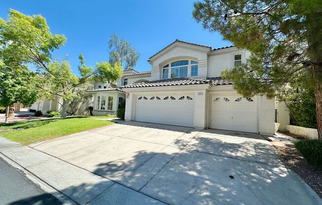 GORGEOUS 2 STORY HOME WITH A GRAND ENTRY & GOLF COURSE VIEW LOCATED INSIDE THE COMMUNITY OF RHODES RANCH