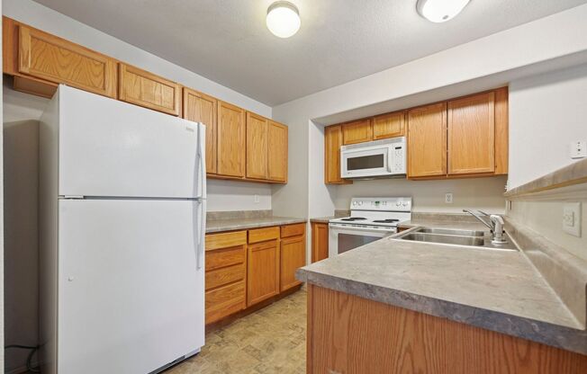 Wonderful End-unit townhome that backs to beautiful open space!