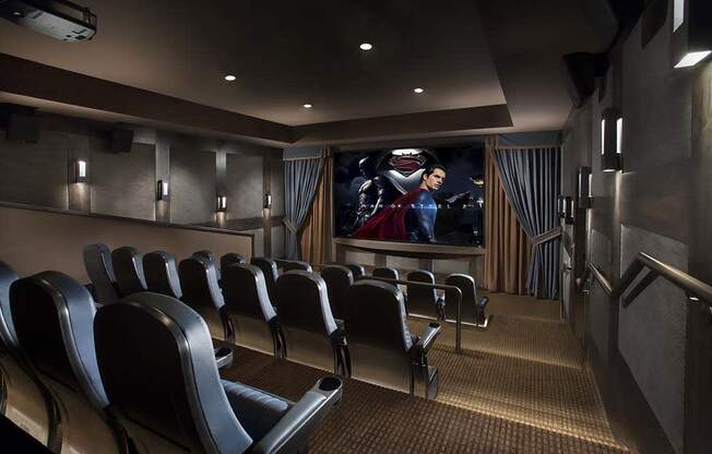 a conference room with chairs and a movie screen