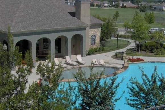 Lounging by the Pool at Stoneleigh on Cartwright Apartments, J Street Property Services, Mesquite,Texas