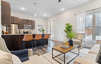 Spacious Living Area With Wood-Style Flooring