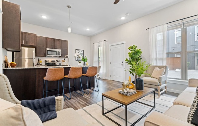 Spacious Living Area With Wood-Style Flooring