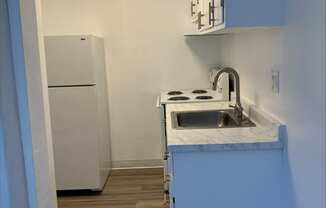 WELCOME TO WOODLAND ARMS APARTMENTS