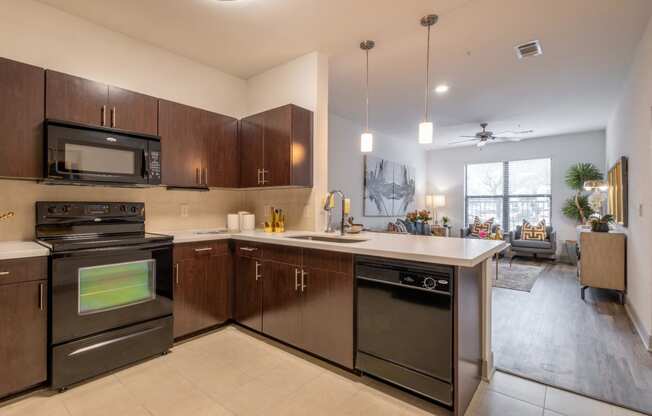spacious open-concept kitchen and living area at The Core apartments