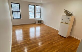 Affordable Apt in Perfect Location Near EVEYTHING.  Heart of Allston Village.  Ht/HW Included