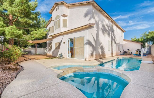 5 Bedroom home with pool and spa with downstairs Bed/bath. No carpet!