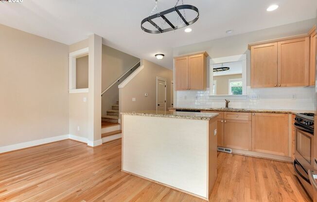 1/2 Month Free! Bright Bull Mountain Townhome - Hardwoods, Granite, Private Patio, Garage, and more!